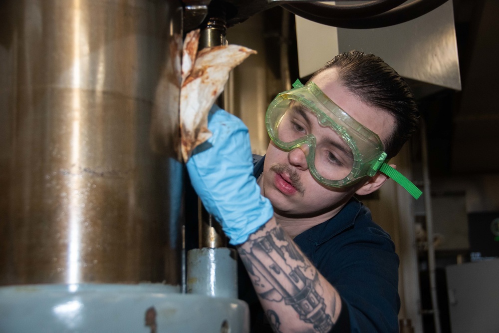 USS Ronald Reagan (CVN 76) Sailors perform maintenance