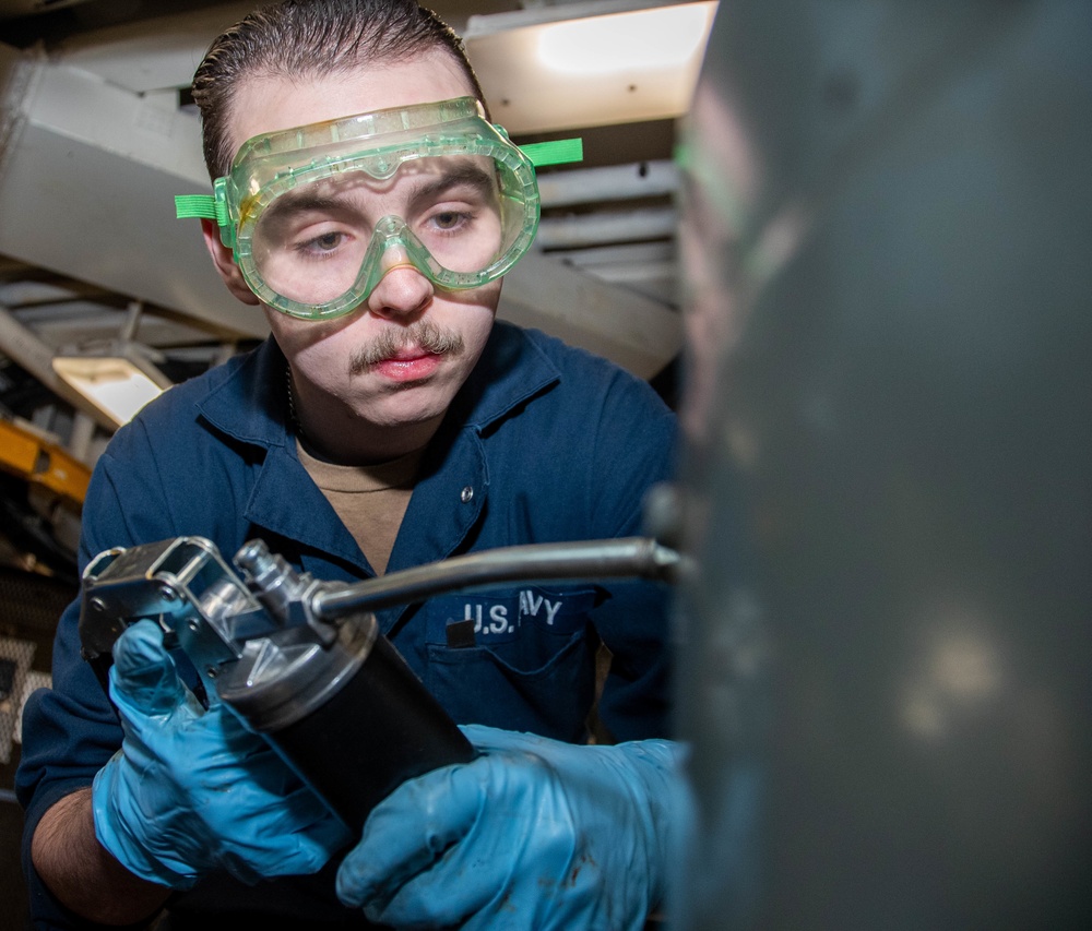 USS Ronald Reagan (CVN 76) Sailors perform maintenance