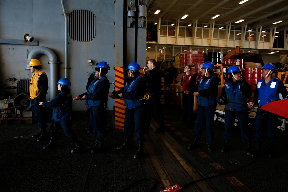 Abraham Lincoln conducts a fueling-at-sea with Kansas City