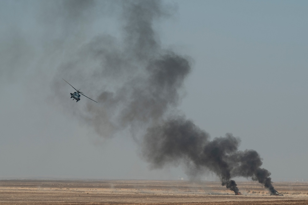 HH60Gs and F15Es conduct combat training