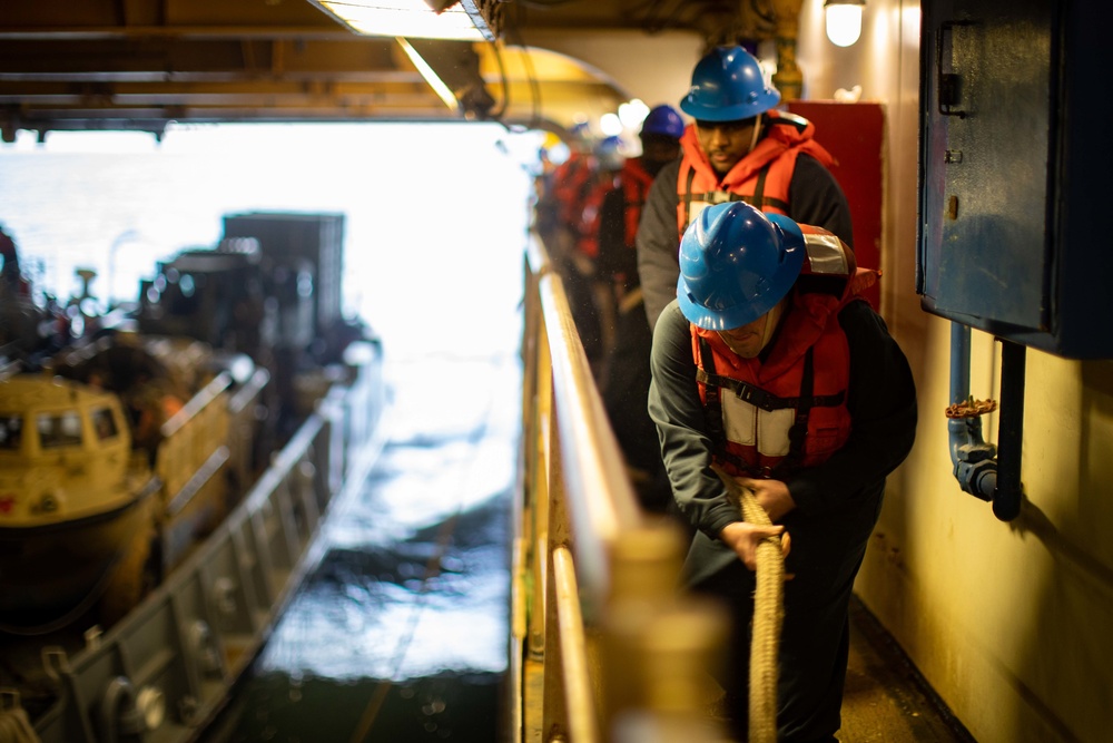 USS BATAAN SAILORS CONDUCT WELL DECK OPERATIONS