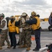 USS BATAAN SAILORS CONDUCT FLIGHT DECK FIRE DRILL