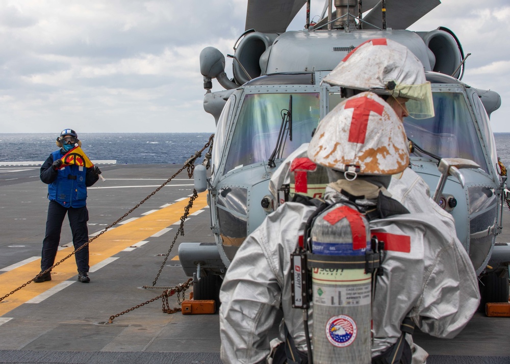 USS BATAAN SAILORS CONDUCT FLIGHT DECK FIRE DRILL