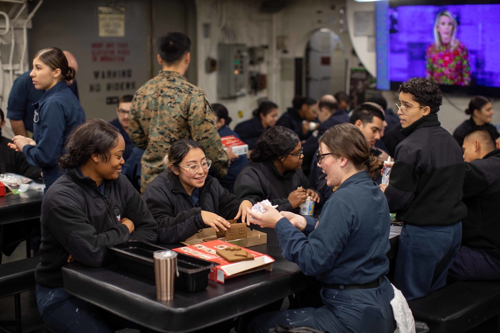 USS BATAAN CSADD SAILORS HOST GINGERBREAD BUILDING