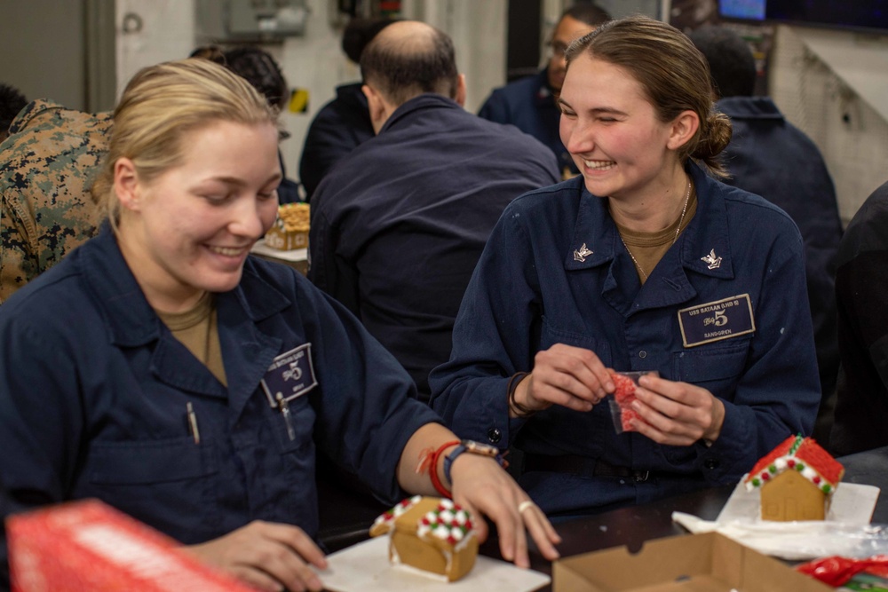 USS BATAAN CSADD SAILORS HOST GINGERBREAD BUILDING