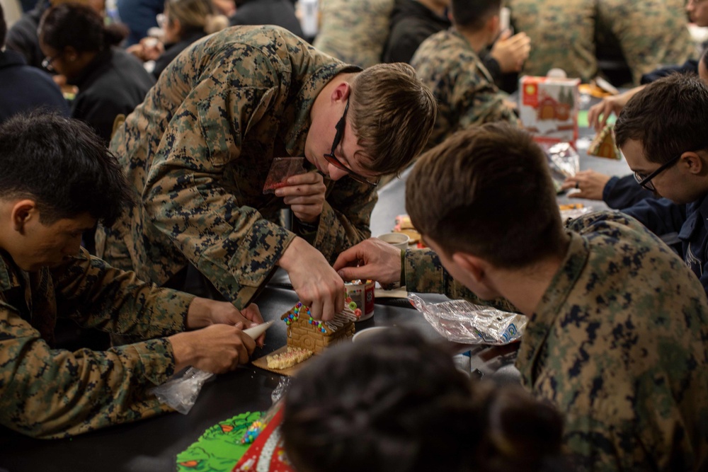 USS BATAAN CSADD SAILORS HOST GINGERBREAD BUILDING