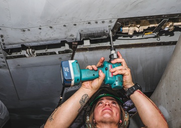 Sailor Performs Maintenance