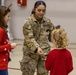 Pfc. Berzosa presents local Polish youth with challenge coins