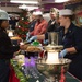 U.S. Sailors share a Christmas meal