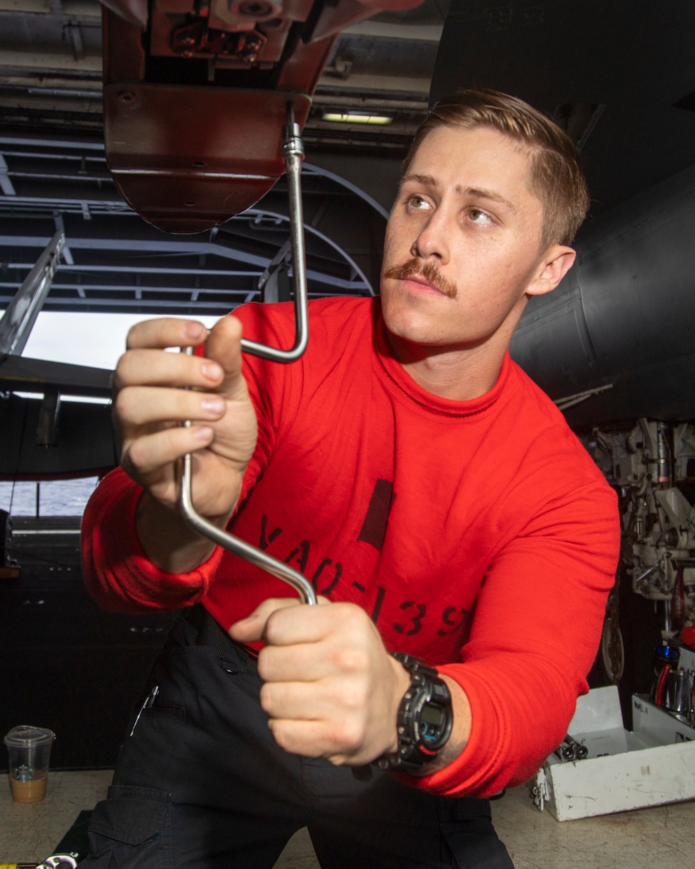 Sailor Closes Bomb Rack Cable Connector Door