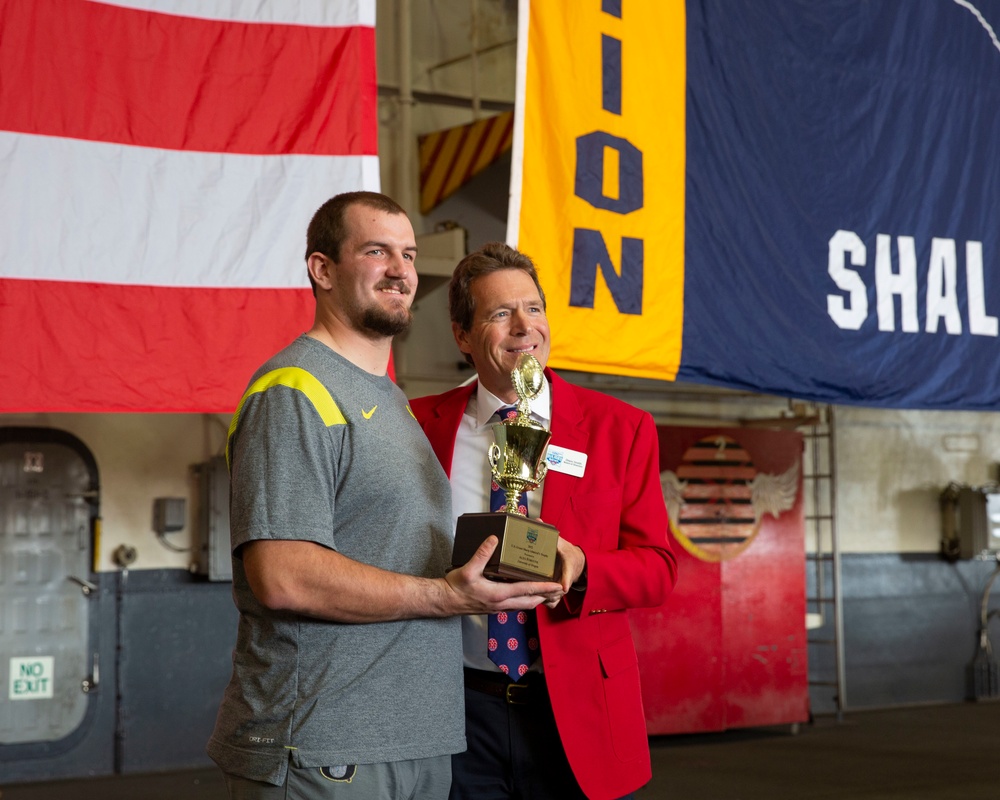 Abraham Lincoln hosts a Holiday Bowl ship tour.