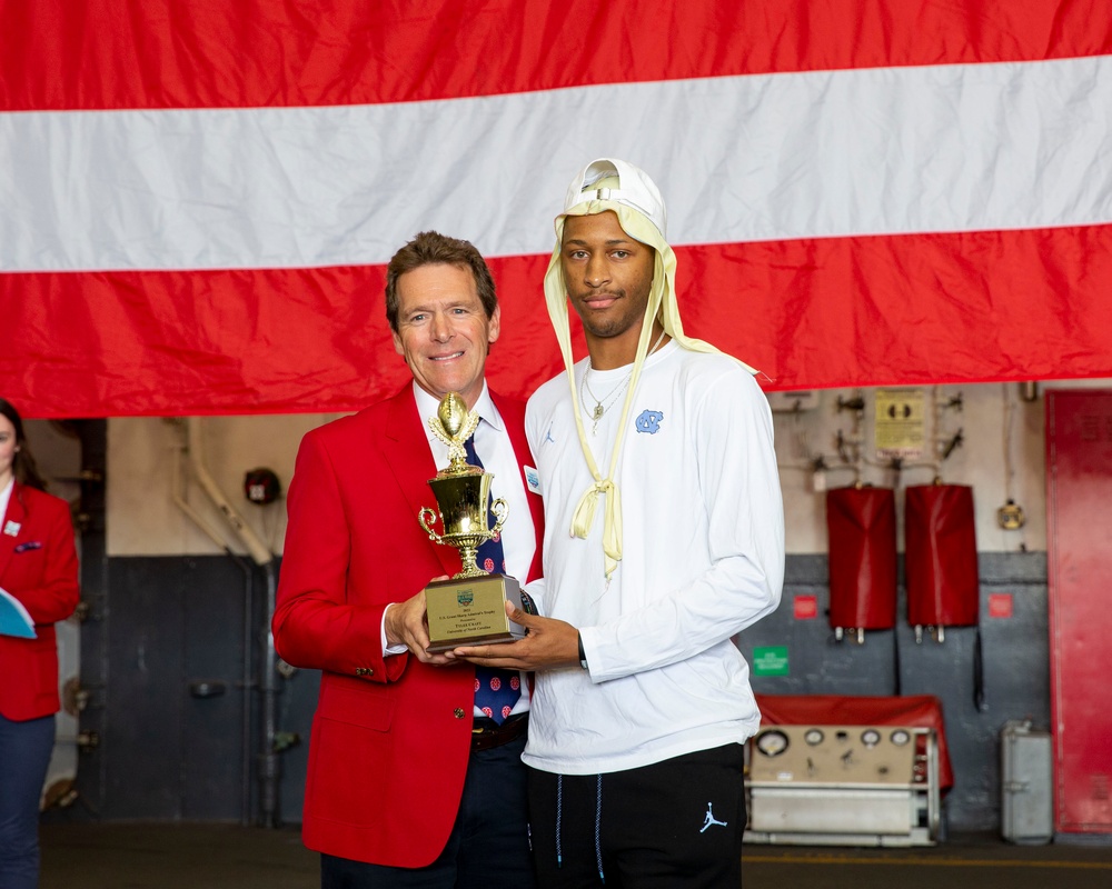 Abraham Lincoln hosts a Holiday Bowl ship tour.