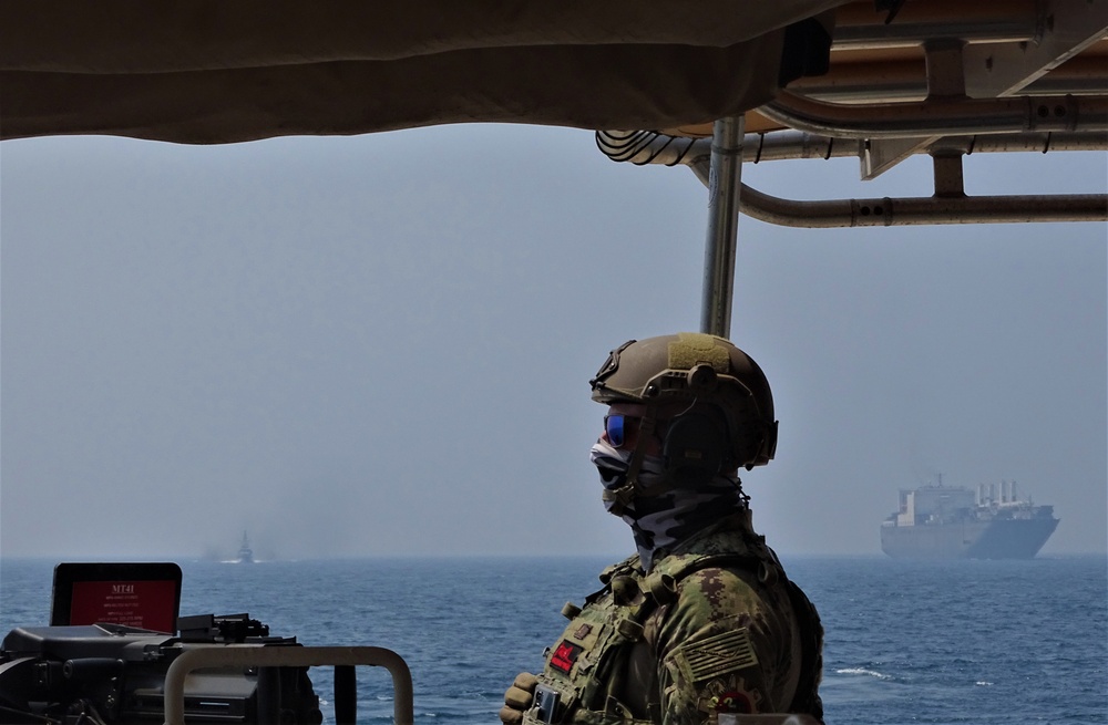 USCGC Charles Moulthrope provides security in a high-value escort through the Strait of Hormuz
