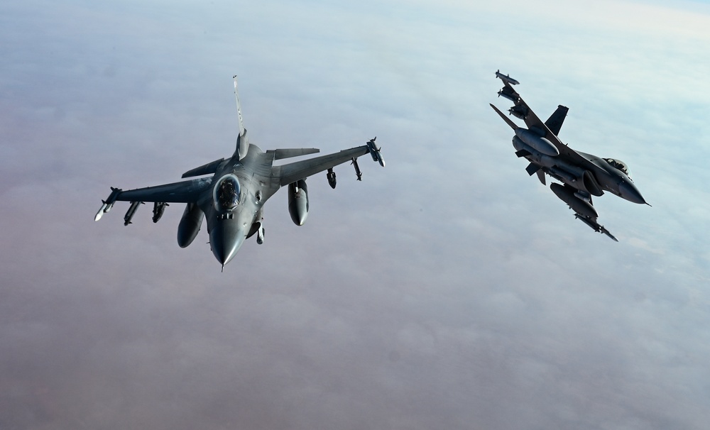 91st EARS KC-135s refuels 77th EFS F-16s