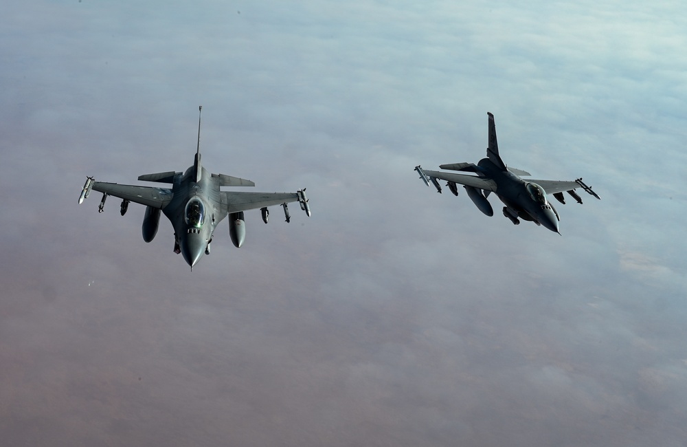 91st EARS KC-135s refuels 77th EFS F-16s