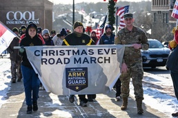 Army Guard troops join march to honor deployed troops