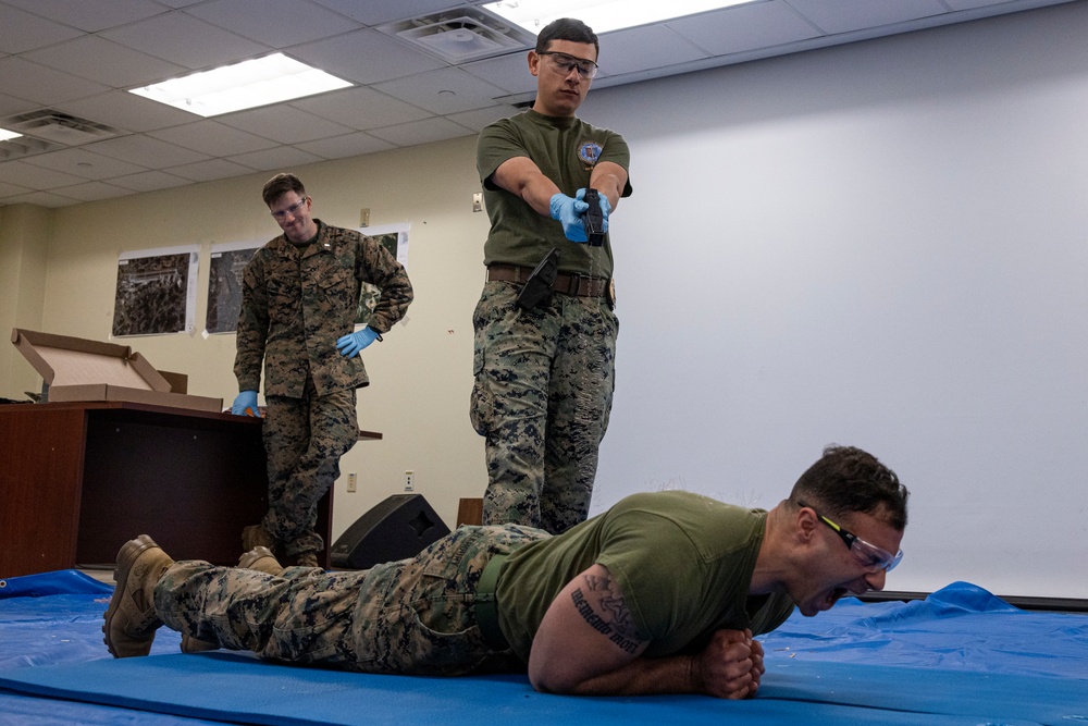 U.S. Marines with Camp Mujuk participate in non-lethal training