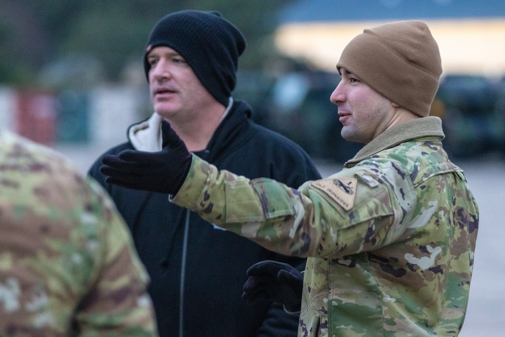 U.S. Army Soldier shows Jerrod Niemann around the 33rd Air Base Powidz, Poland