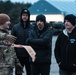 U.S. Army Soldier shows Jerrod Niemann around the 33rd Air Base Powidz, Poland