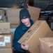 U.S. Navy Sailor Moves Frozen Goods