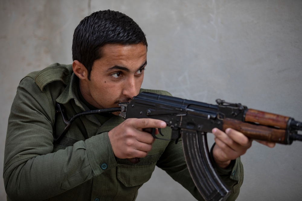 Asayish guards train at a Syrian Internal Security Forces academy