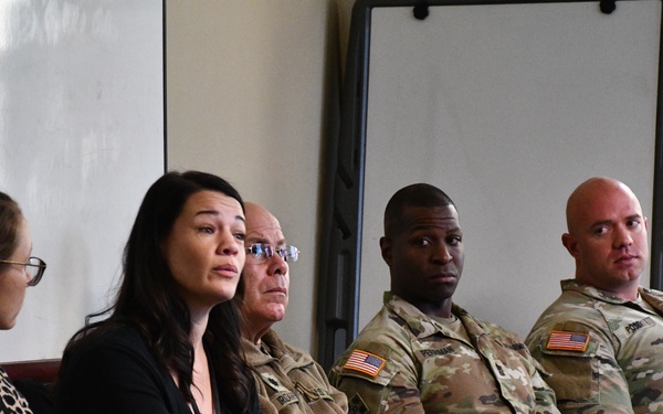 Panelists engage in discussion with Soldiers in the Headquarters Battalion