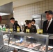 Senator Moran, Brig. Gen. Knell serving Thanksgiving meals to Soldiers