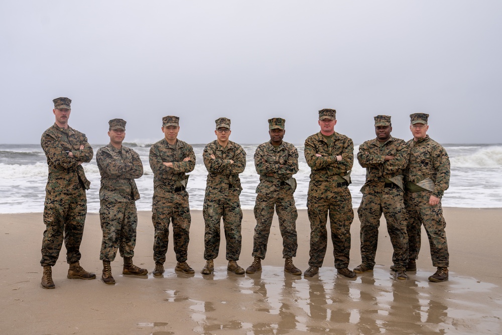 First Marine Corps District awards, reenlists Sgt. Kokou D. Adjogble