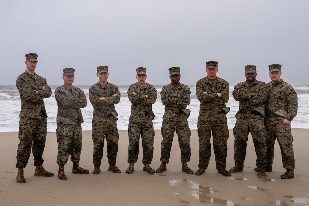 First Marine Corps District awards, reenlists Sgt. Kokou D. Adjogble