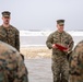 First Marine Corps District awards, reenlists Sgt. Kokou D. Adjogble