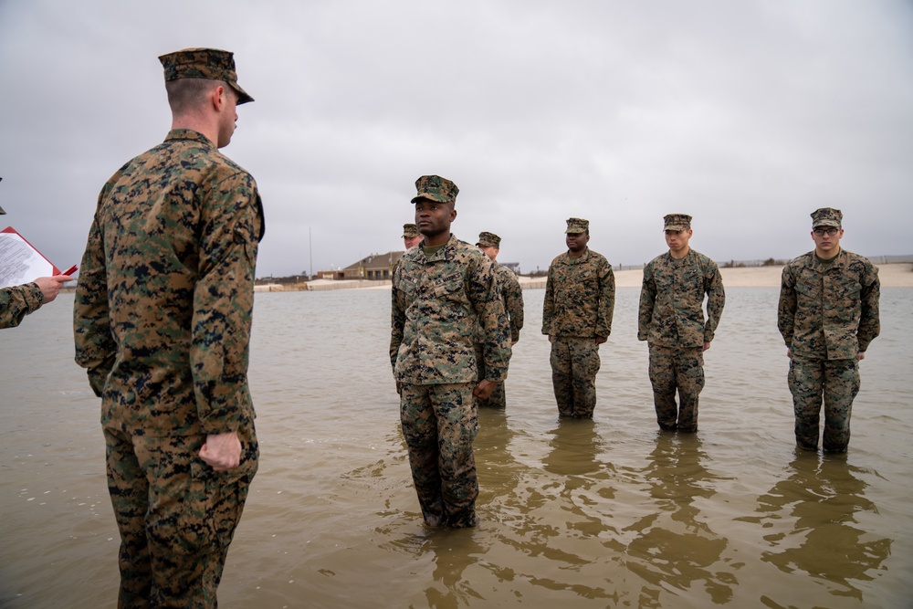 First Marine Corps District awards, reenlists Sgt. Kokou D. Adjogble