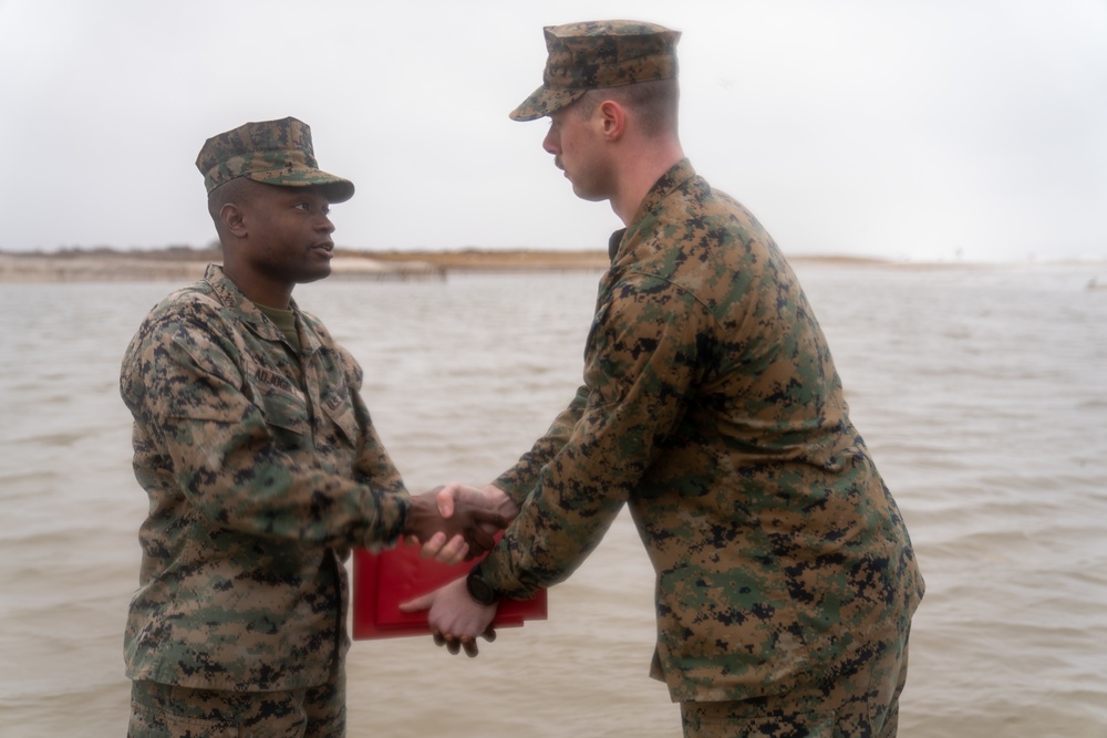 First Marine Corps District Awards and Reenlists Sgt. Kokou D. Adjogble