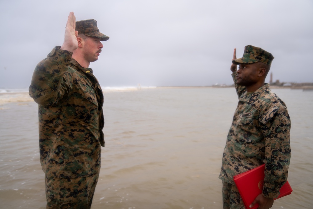 First Marine Corps District awards, reenlists Sgt. Kokou D. Adjogble