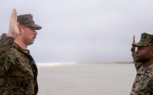 First Marine Corps District awards, reenlists Sgt. Kokou D. Adjogble