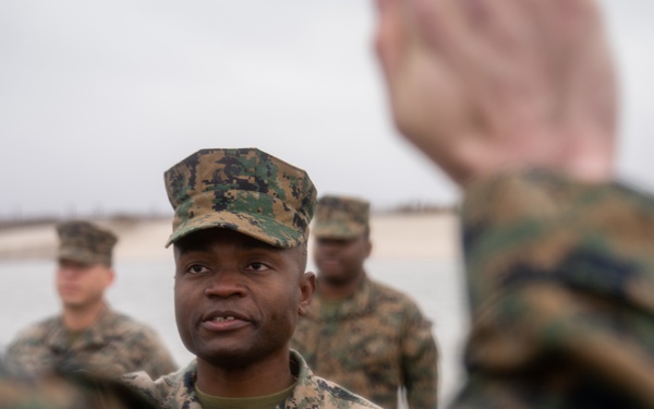 First Marine Corps District awards, reenlists Sgt. Kokou D. Adjogble
