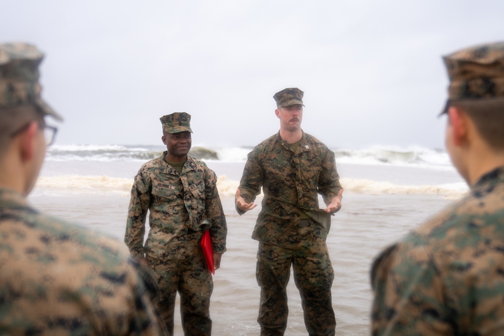 First Marine Corps District awards, reenlists Sgt. Kokou D. Adjogble