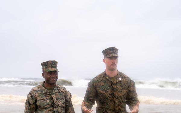 First Marine Corps District awards, reenlists Sgt. Kokou D. Adjogble