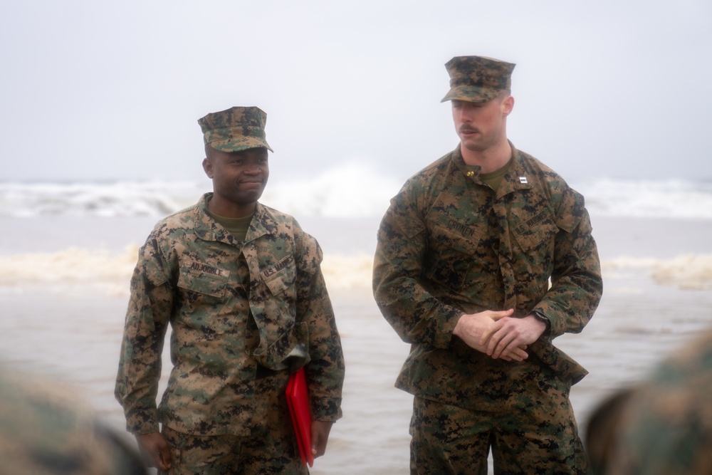 First Marine Corps District awards, reenlists Sgt. Kokou D. Adjogble