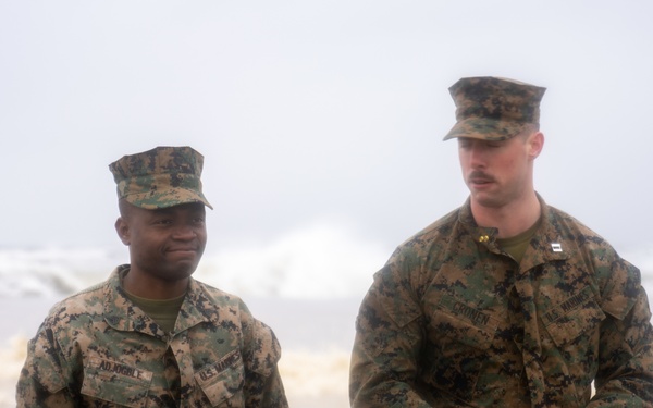 First Marine Corps District awards, reenlists Sgt. Kokou D. Adjogble