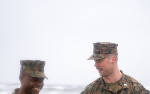 First Marine Corps District awards, reenlists Sgt. Kokou D. Adjogble