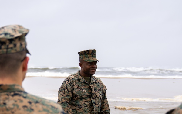 First Marine Corps District awards, reenlists Sgt. Kokou D. Adjogble