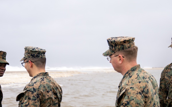 First Marine Corps District awards, reenlists Sgt. Kokou D. Adjogble