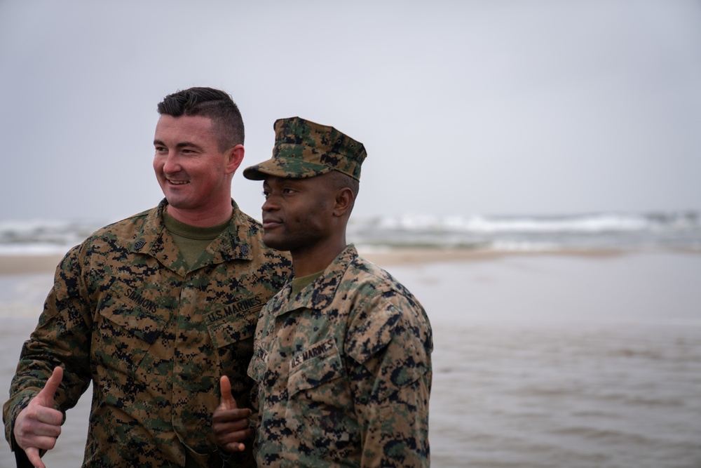 First Marine Corps District awards, reenlists Sgt. Kokou D. Adjogble