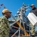 USS Ronald Reagan (CVN 76) Sailors transport cargo