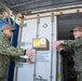 USS Ronald Reagan (CVN 76) Sailors transport cargo