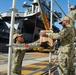 USS Ronald Reagan (CVN 76) Sailors transport cargo