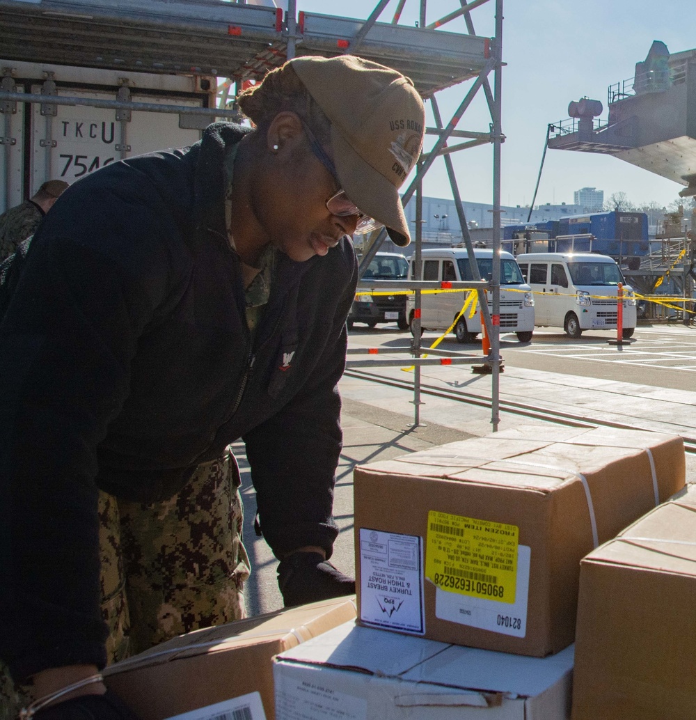 USS Ronald Reagan (CVN 76) Sailors transport cargo