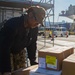 USS Ronald Reagan (CVN 76) Sailors transport cargo