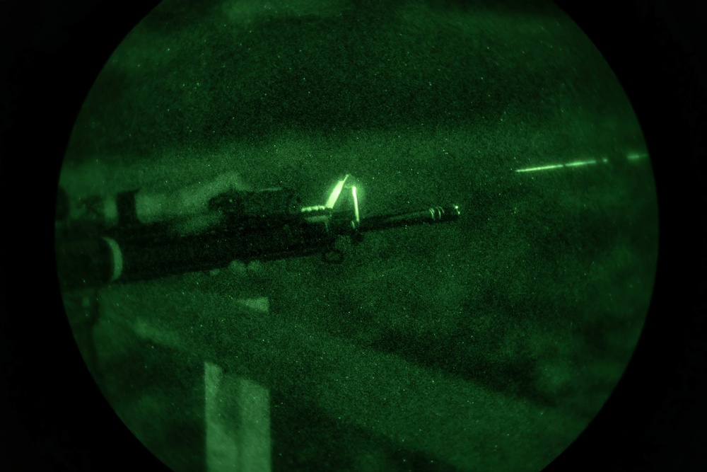 US Marines conduct a night range during the Marine Corps Marksmanship Competition Far East