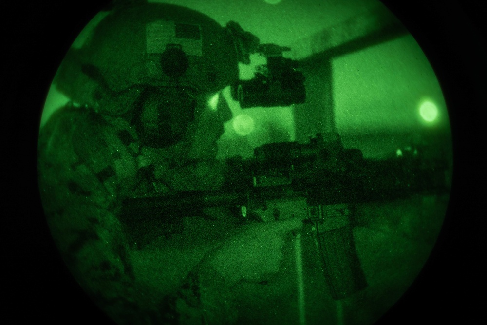 US Marines conduct a night range during the Marine Corps Marksmanship Competition Far East